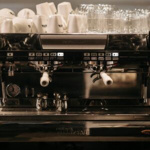 A high-quality espresso machine in a coffee shop setting, perfect for cafe-themed content.